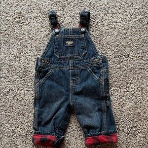 Vintage Osh Kosh flannel lined overalls.